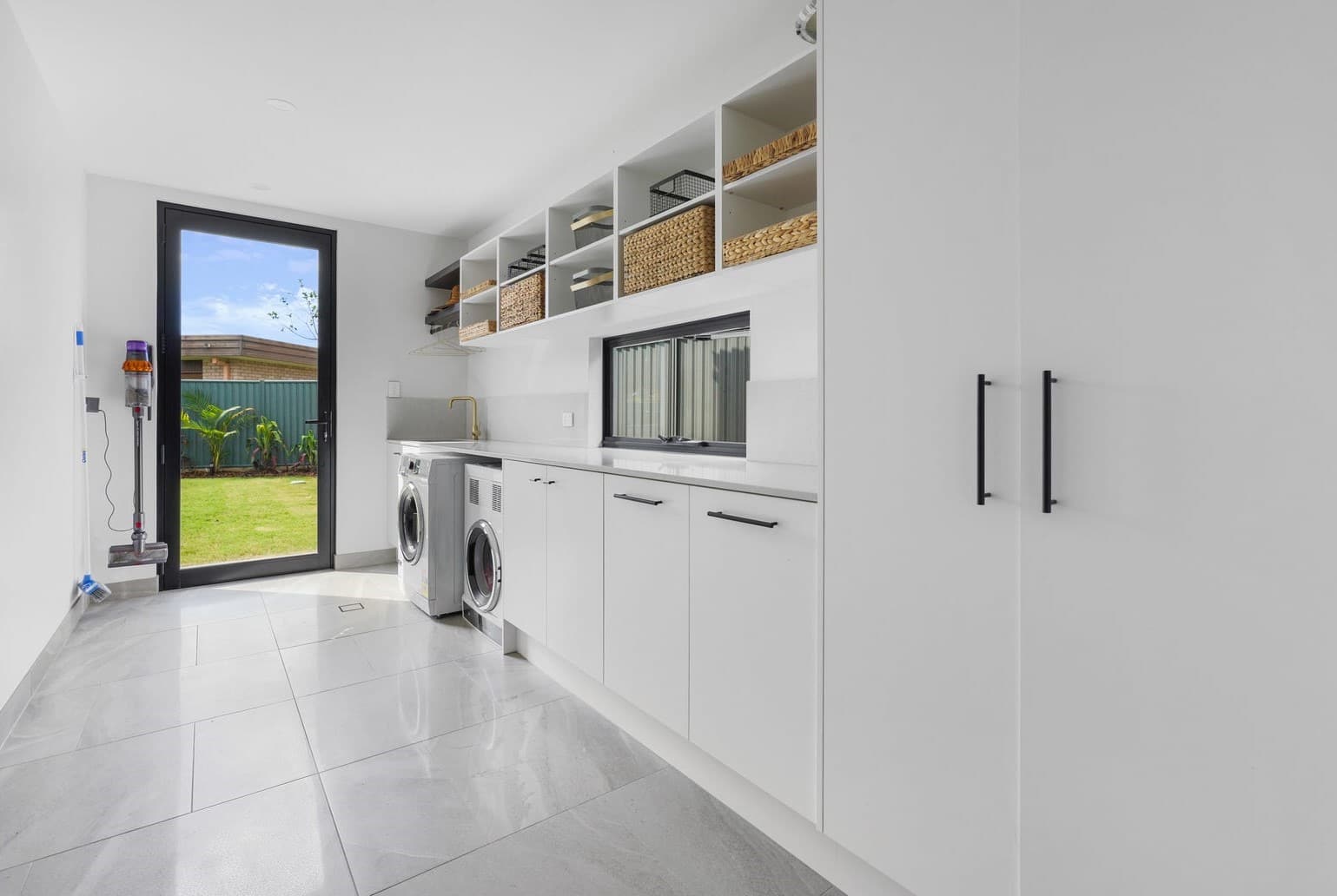 Black Hinged Door in Laundry